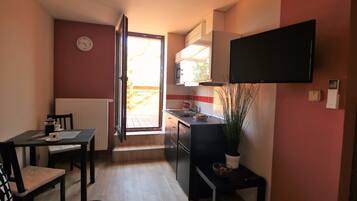 Comfort Apartment, Terrace (Kitchenette) | Living area | Flat-screen TV