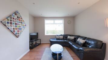 Family Apartment, 2 Bedrooms, Ground Floor | Living area | Flat-screen TV