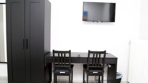 Desk, iron/ironing board (on request), WiFi (free), bed sheets