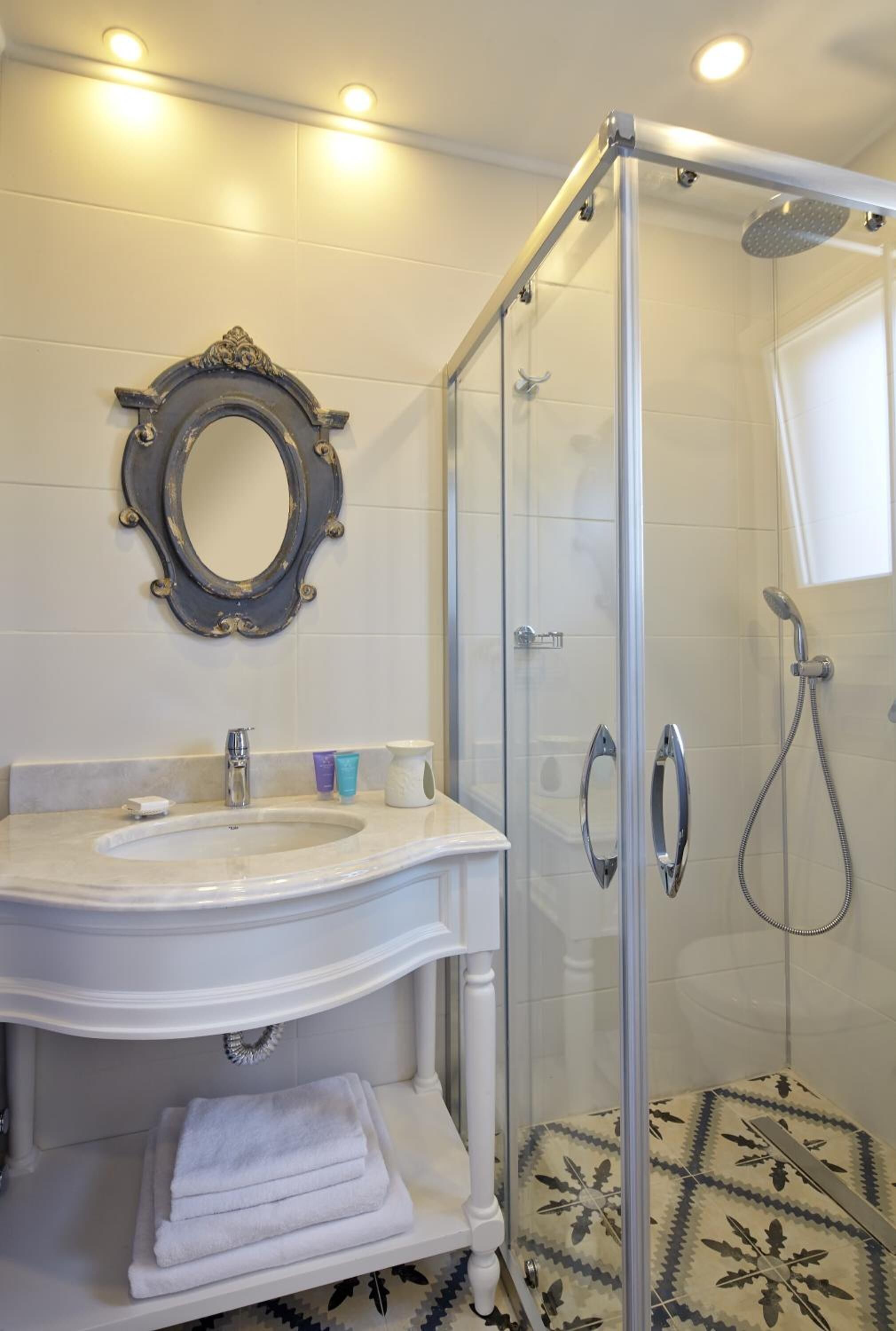 room | bathroom | shower, designer toiletries, hair dryer, slippers