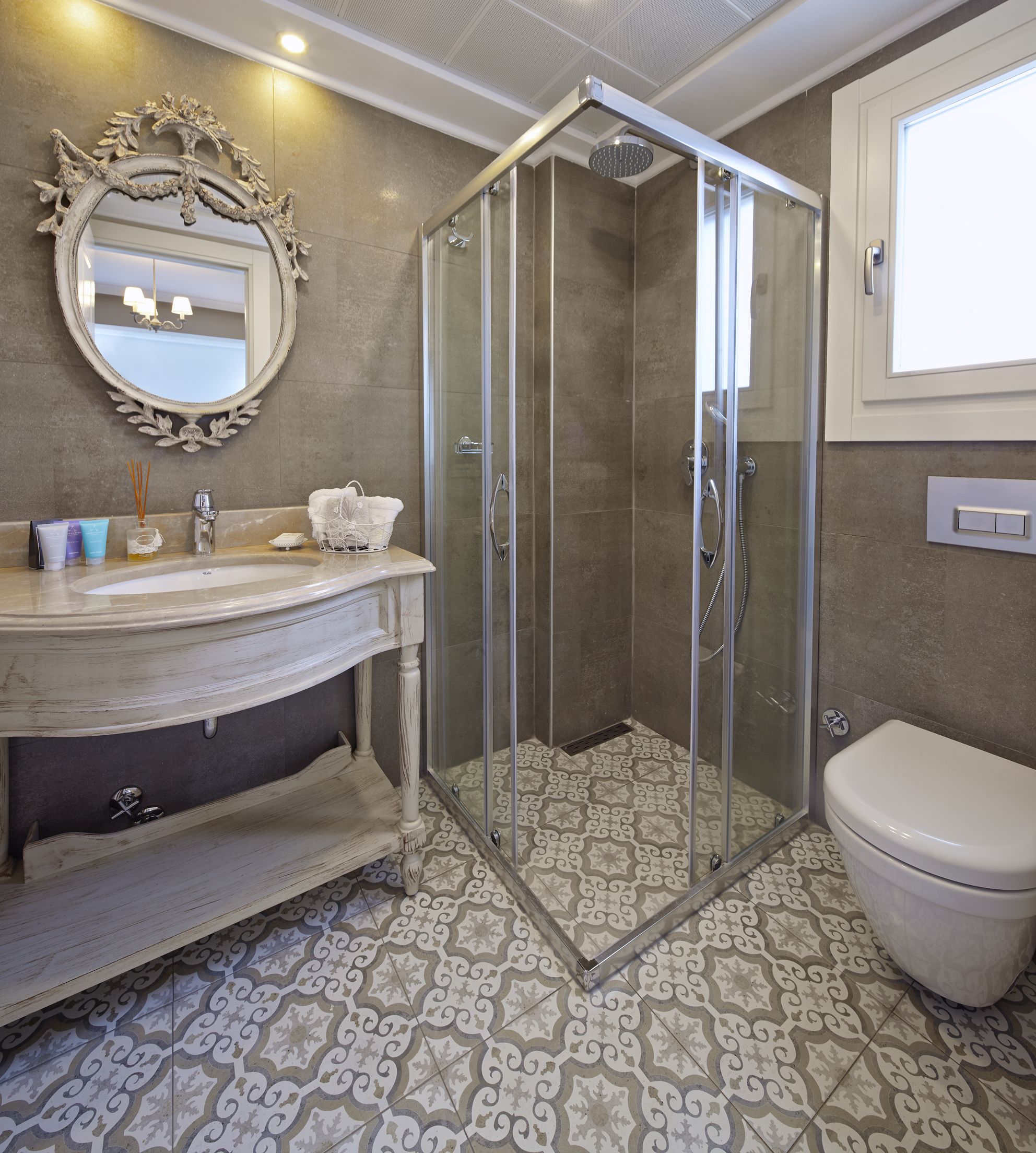 shower, designer toiletries, hair dryer, slippers