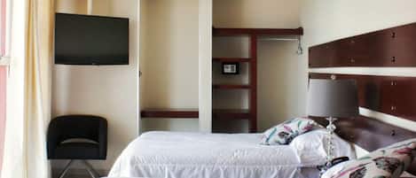 In-room safe, desk, laptop workspace, iron/ironing board