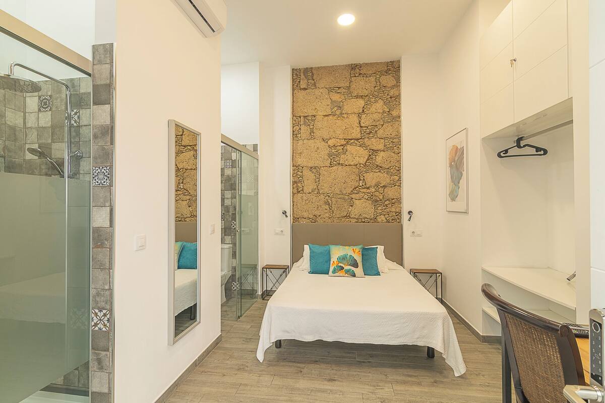 Tempur-Pedic beds, desk, laptop workspace, soundproofing