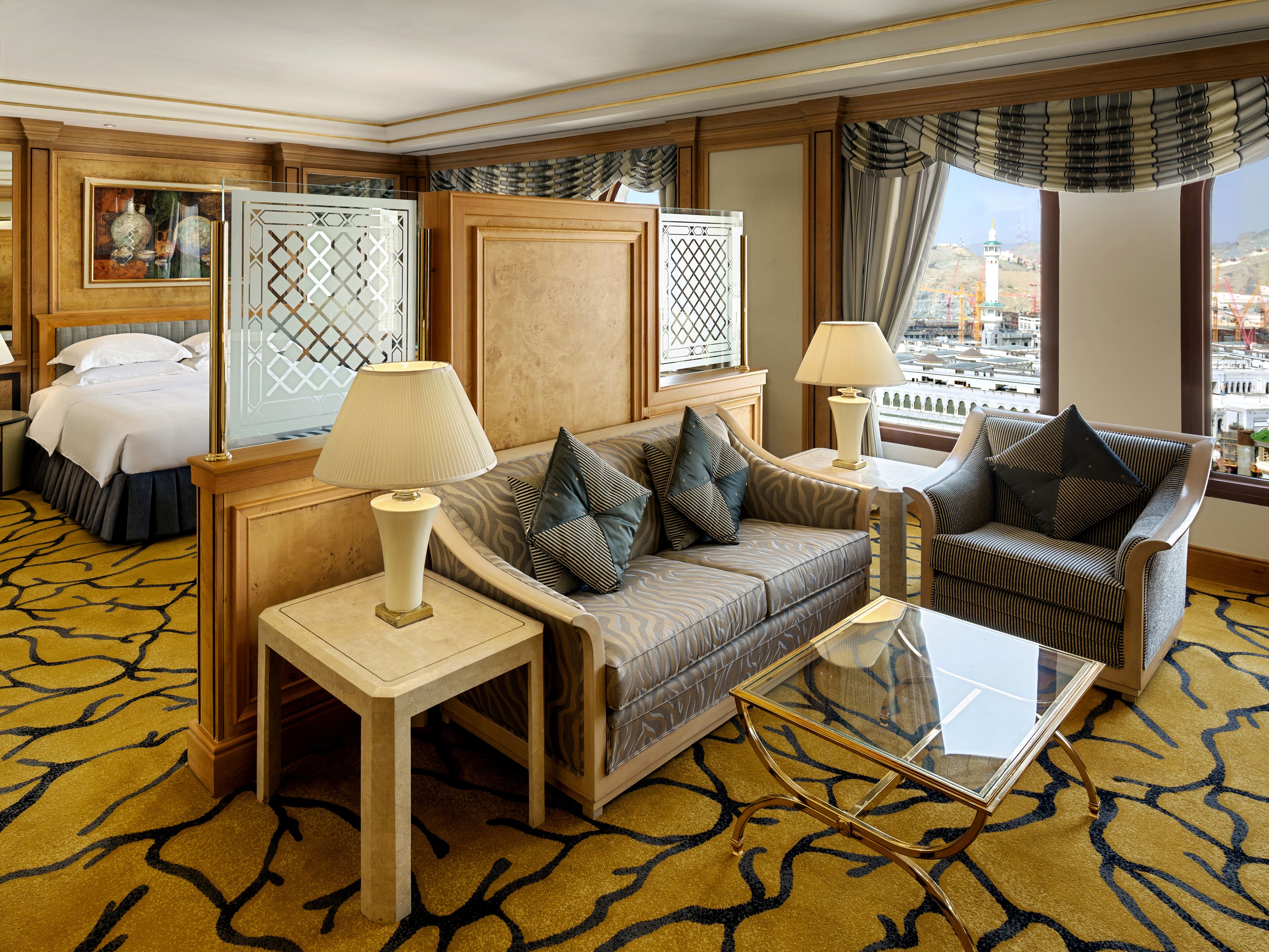 presidential suite with one king bed and two twin beds | living area | 37-inch lcd tv with satellite channels, tv