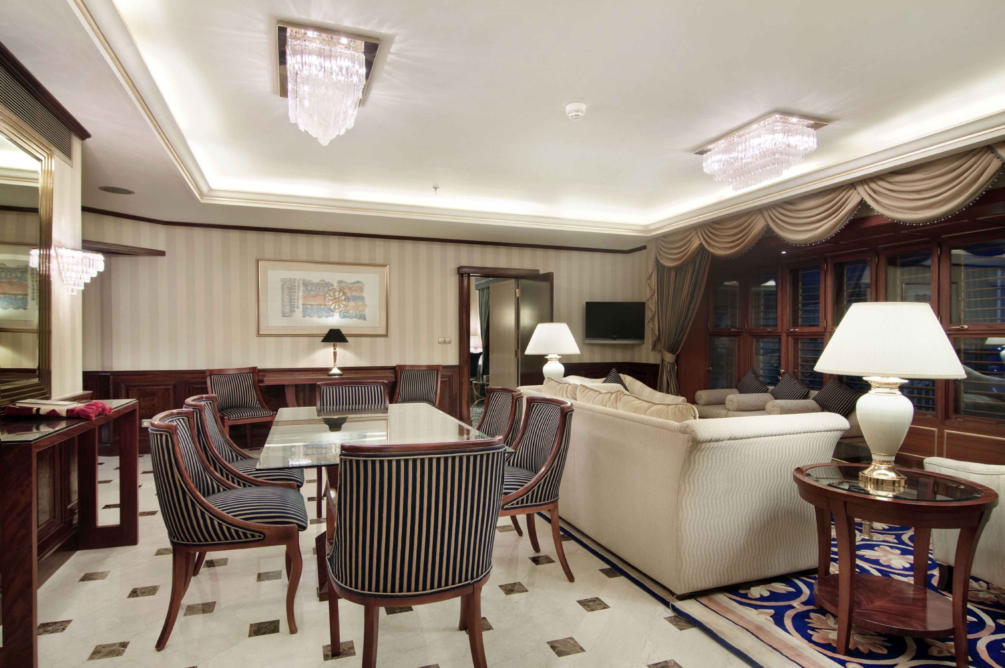 one bedroom king suite haram view with one king bed | living area | 37-inch lcd tv with satellite channels, tv