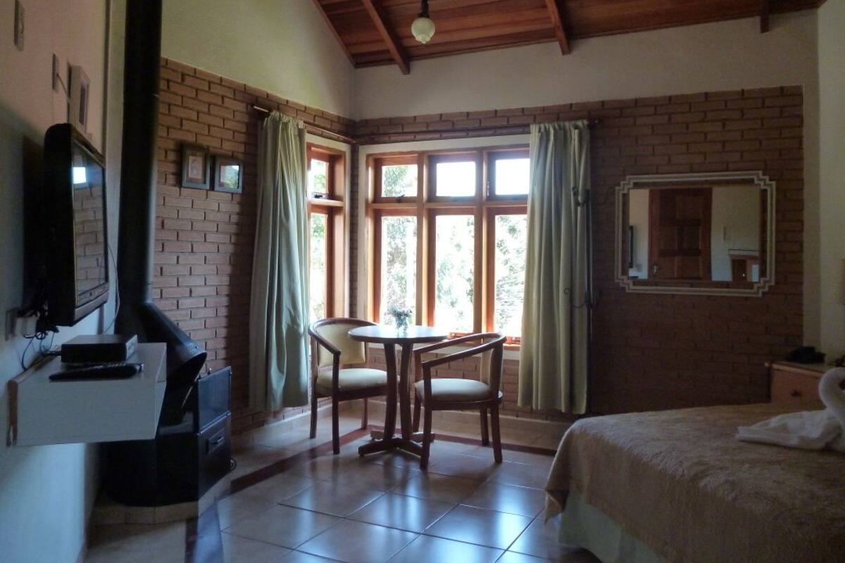 Chalé Grand Luxo | 1 camera, minibar, una scrivania, ferro/asse da stiro