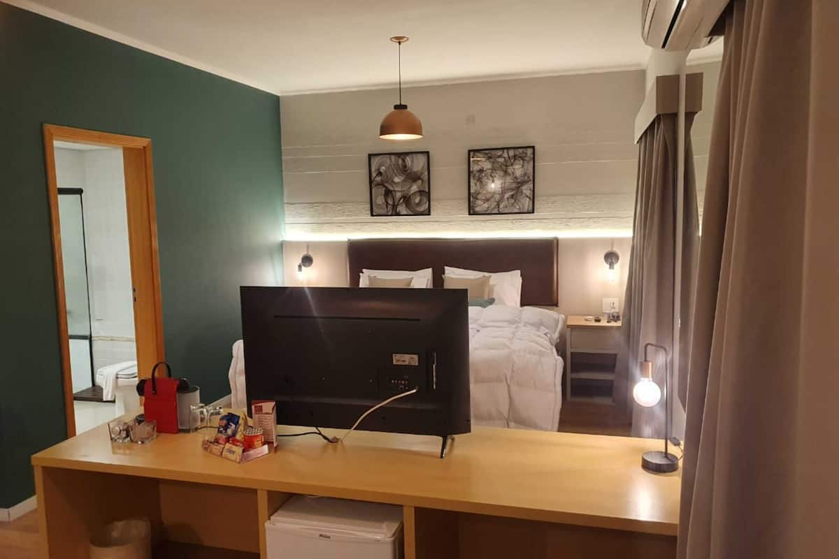 superior suite | 1 bedroom, in-room safe, desk, blackout curtains
