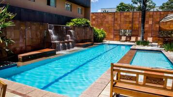 Outdoor pool, open 6:00 AM to 10:00 PM, sun loungers