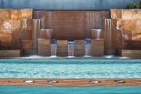 Outdoor pool, open 6:00 AM to 10:00 PM, sun loungers