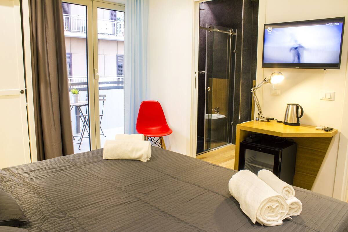 Junior Suite, Balcony | Premium bedding, minibar, in-room safe, desk