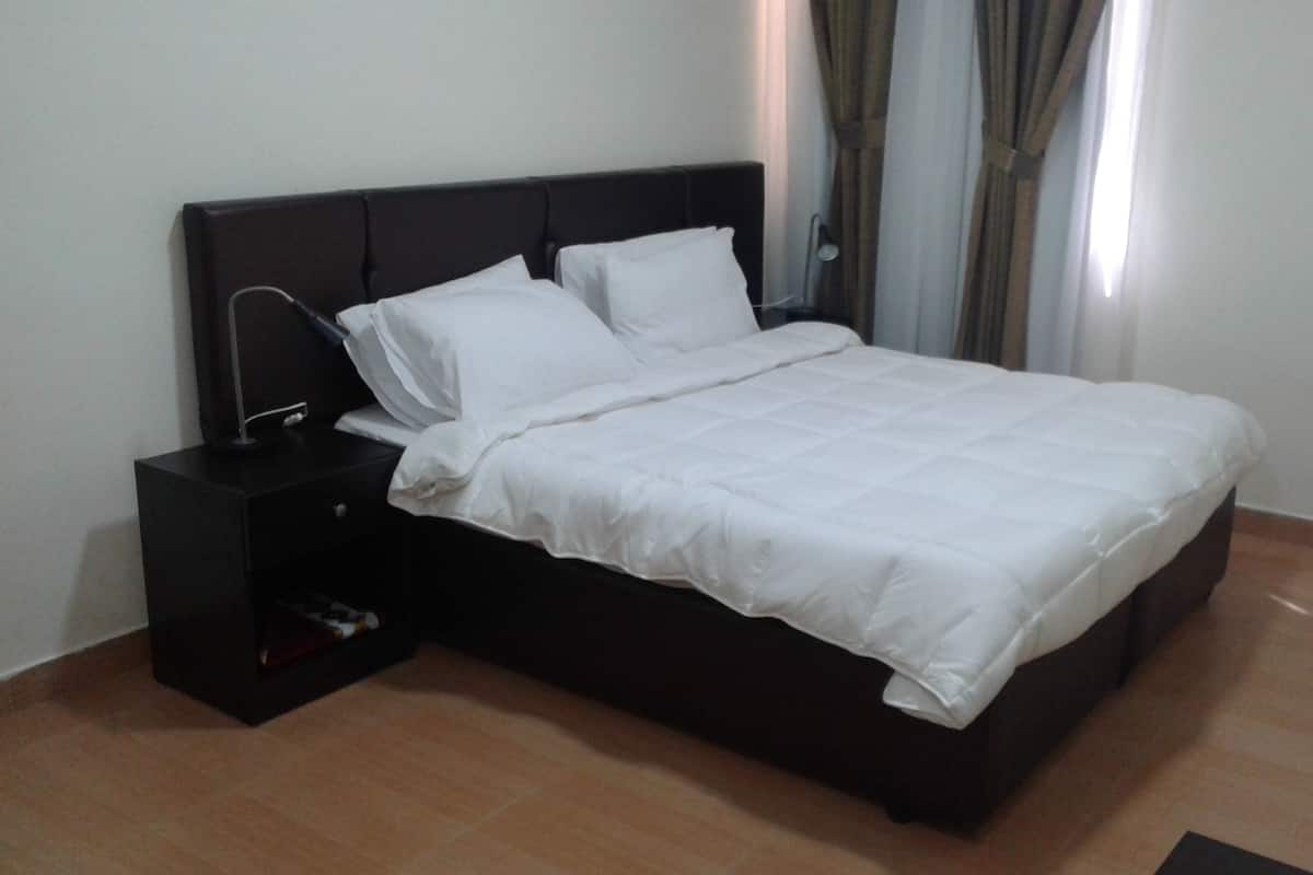 Minibar, desk, blackout drapes, iron/ironing board