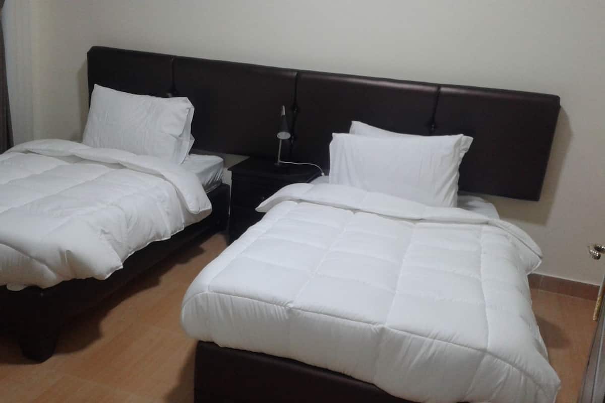 Minibar, desk, blackout drapes, iron/ironing board
