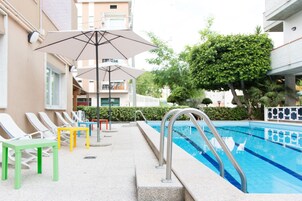 Seasonal outdoor pool, pool umbrellas, sun loungers