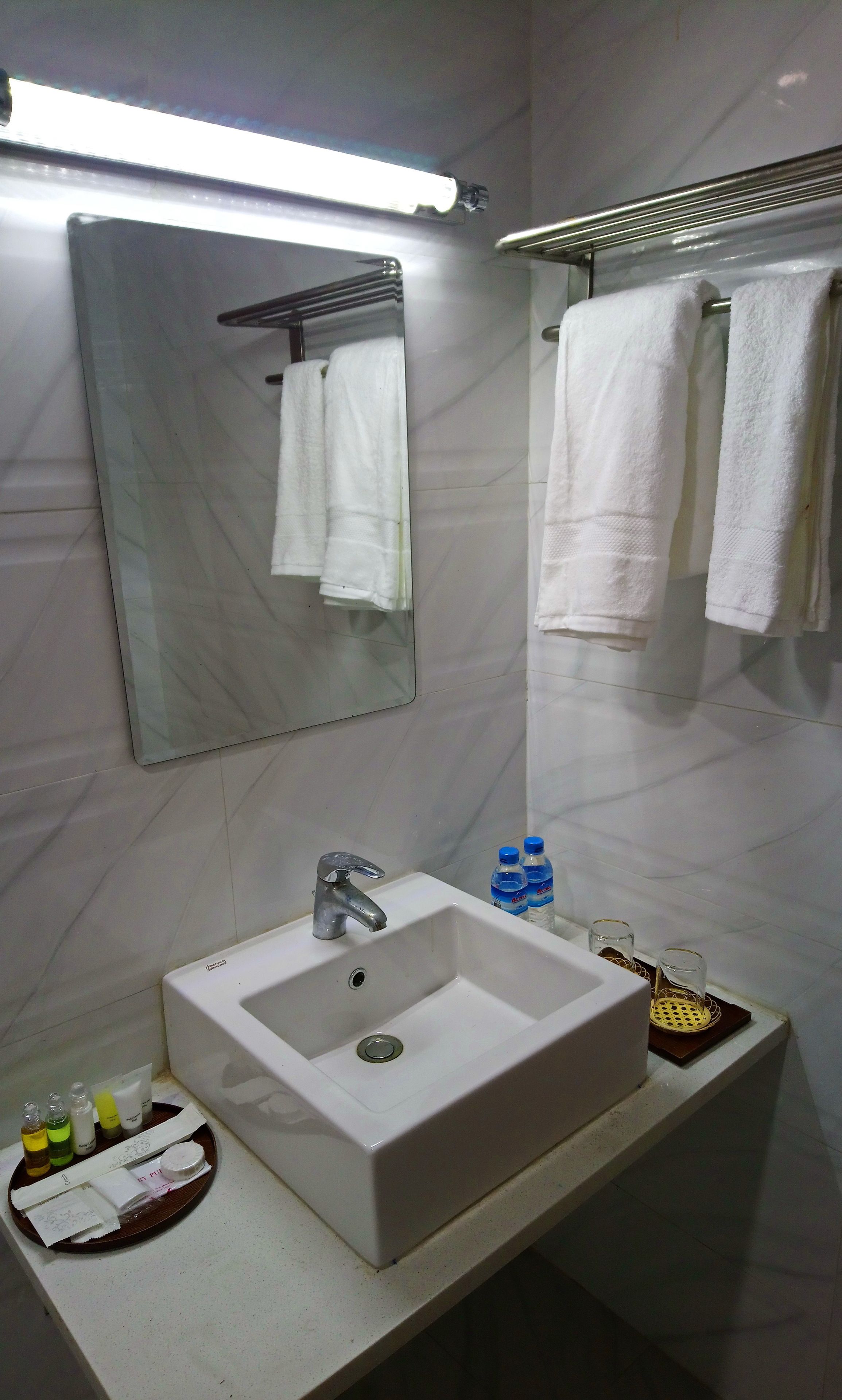 beachfront deluxe sea view | bathroom | shower, free toiletries, hair dryer, towels