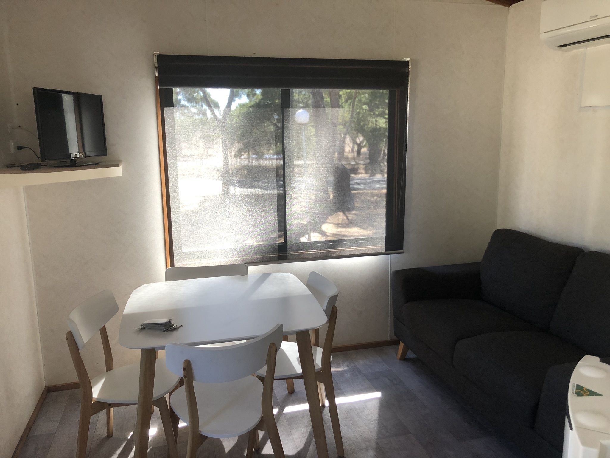 Basic Cabin, 2 Bedrooms | Living area | Flat-screen TV