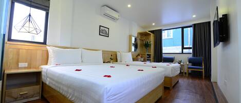 Family Suite, City View | Minibar, in-room safe, desk, soundproofing