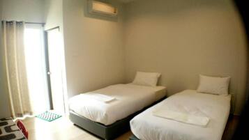 Desk, blackout curtains, free WiFi, bed sheets