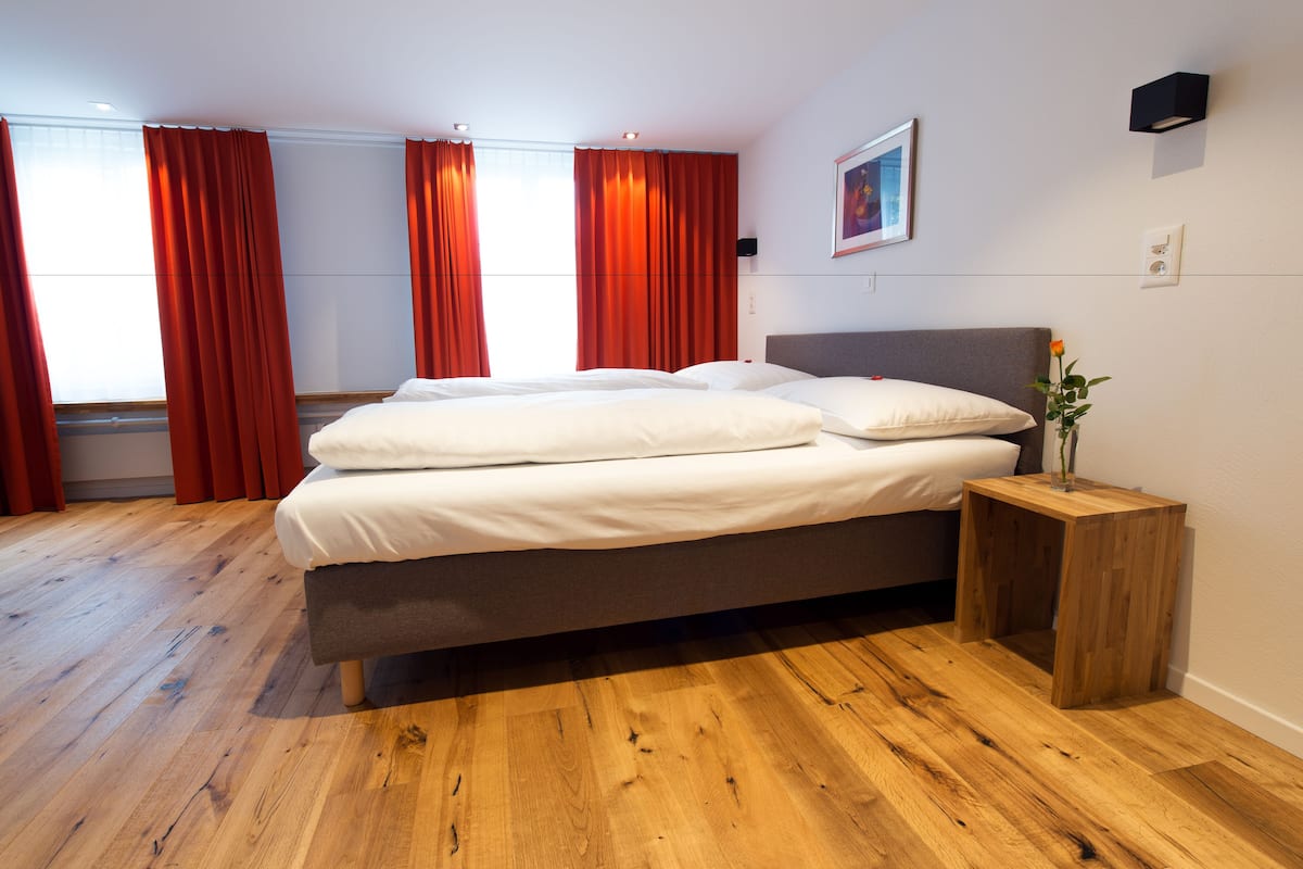 desk, blackout curtains, soundproofing, cots/infant beds