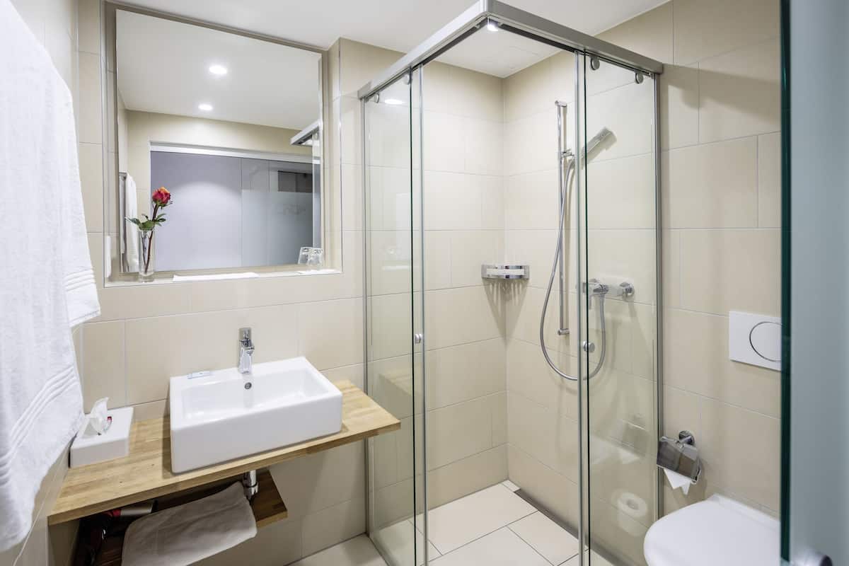 classic single room | bathroom | free toiletries, hair dryer, towels