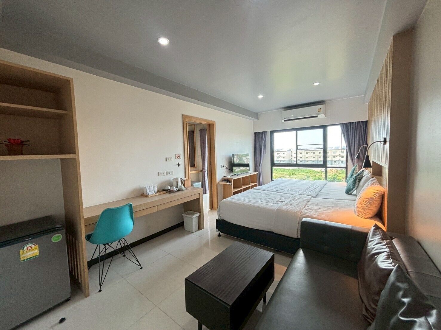 Deluxe Triple Room | Individually decorated, blackout drapes, rollaway beds, free WiFi