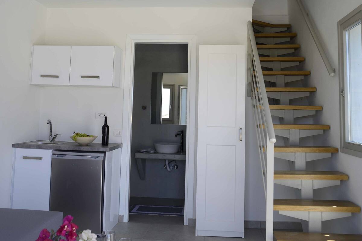 duplex, sea view | living area | flat-screen tv