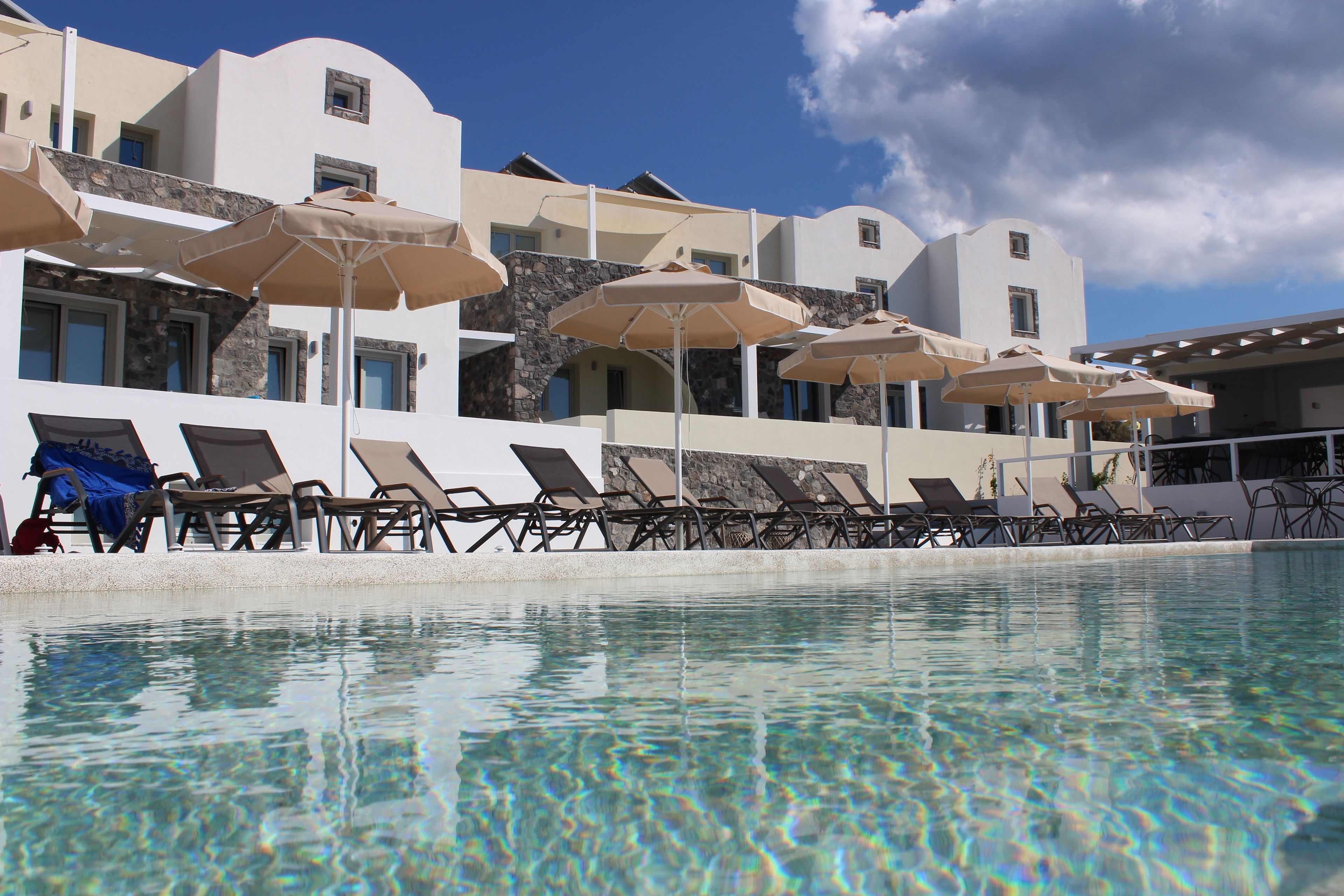 outdoor pool, pool umbrellas, pool loungers