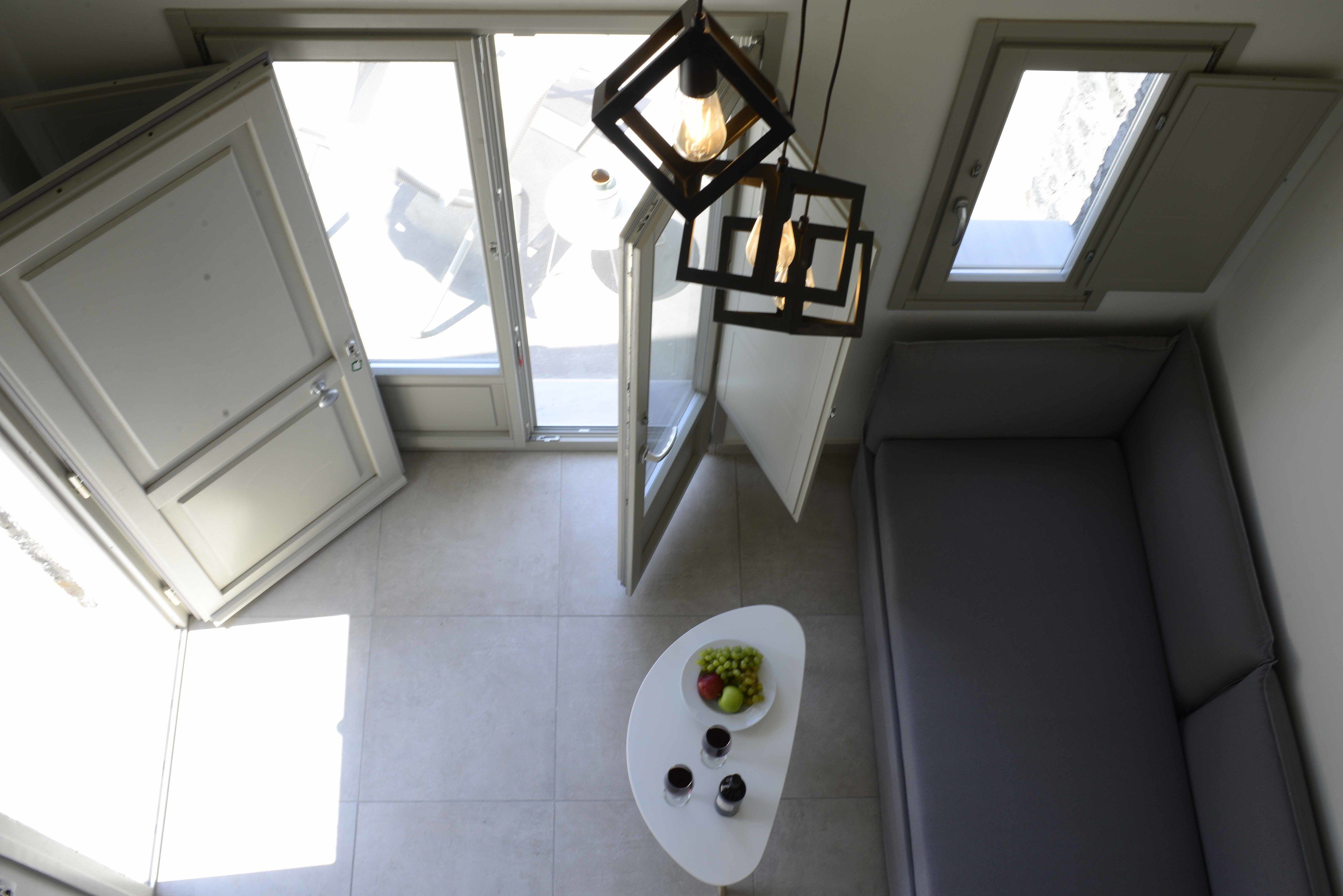 duplex, sea view | living area | flat-screen tv