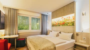 Comfort tweepersoonskamer | Een bureau, geluiddichte muren, gratis wifi