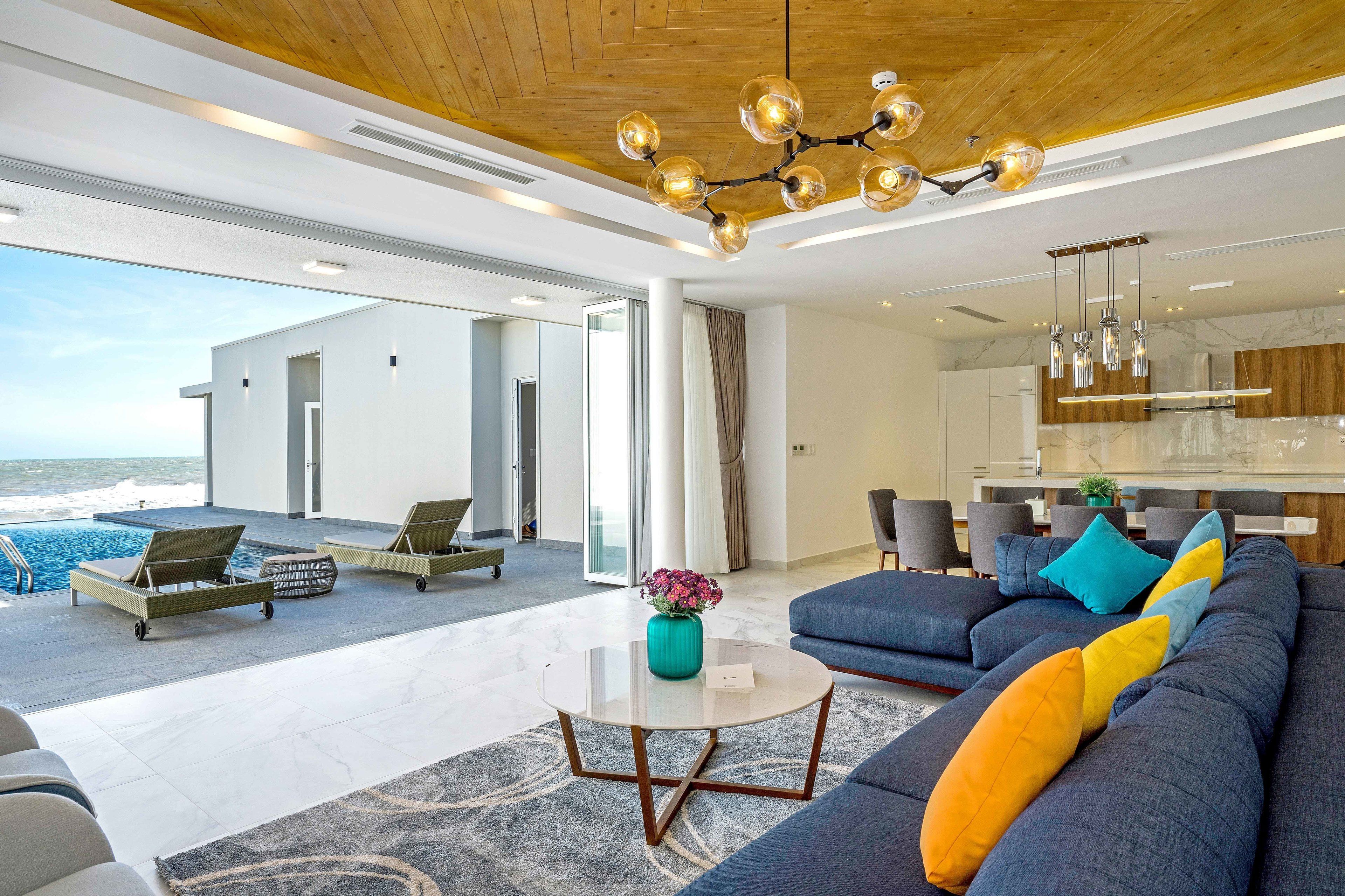 Villa, 4 Bedrooms, Beachfront | Living area | 43-inch LCD TV with cable channels, TV