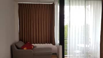 Basic Double Room Single Use | Living area | LCD TV