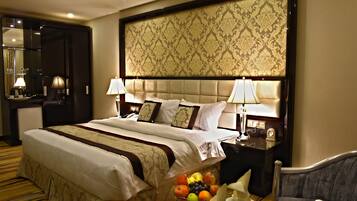 Chambre Deluxe Double ou avec lits jumeaux | Minibar, coffres-forts dans les chambres, rideaux occultants