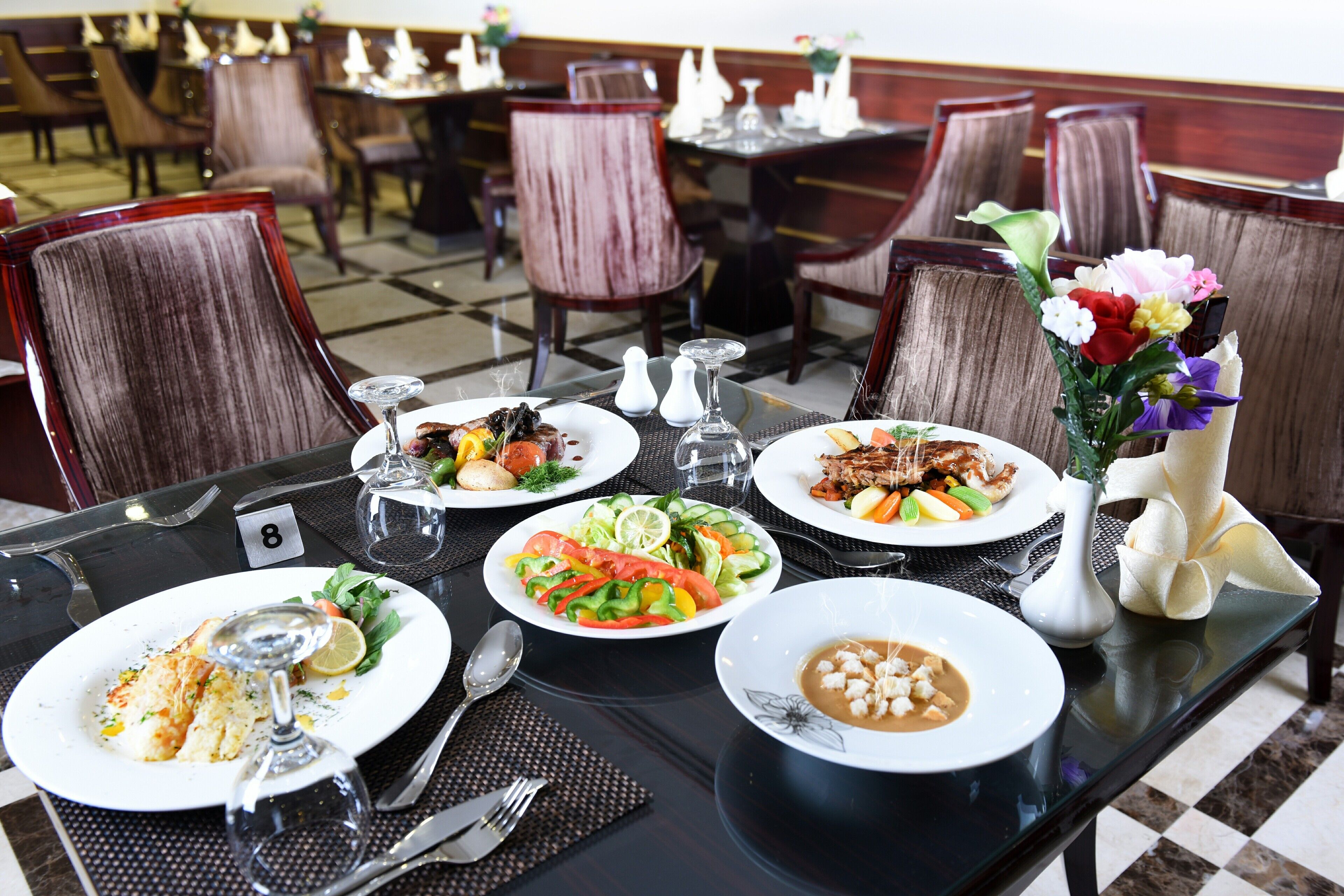 Breakfast, lunch, dinner served; local and international cuisine 