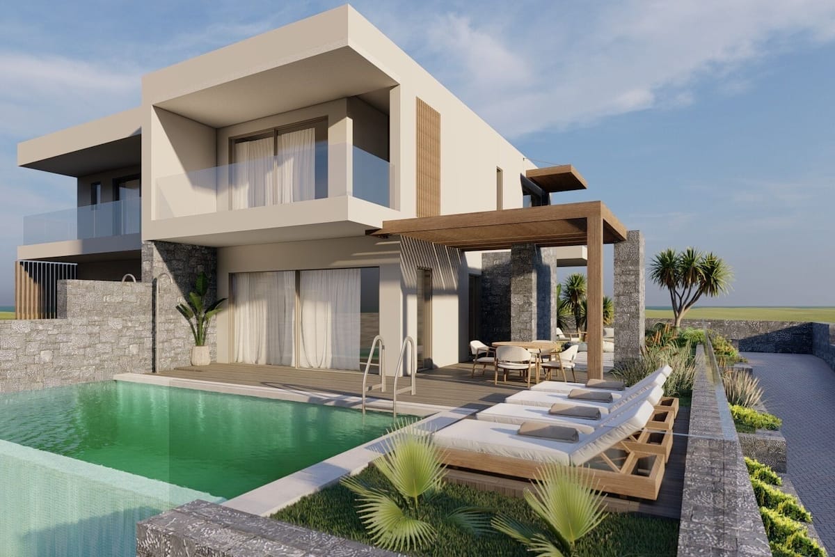 A modern two-story house with a swimming pool, outdoor seating, and a view of the sea.