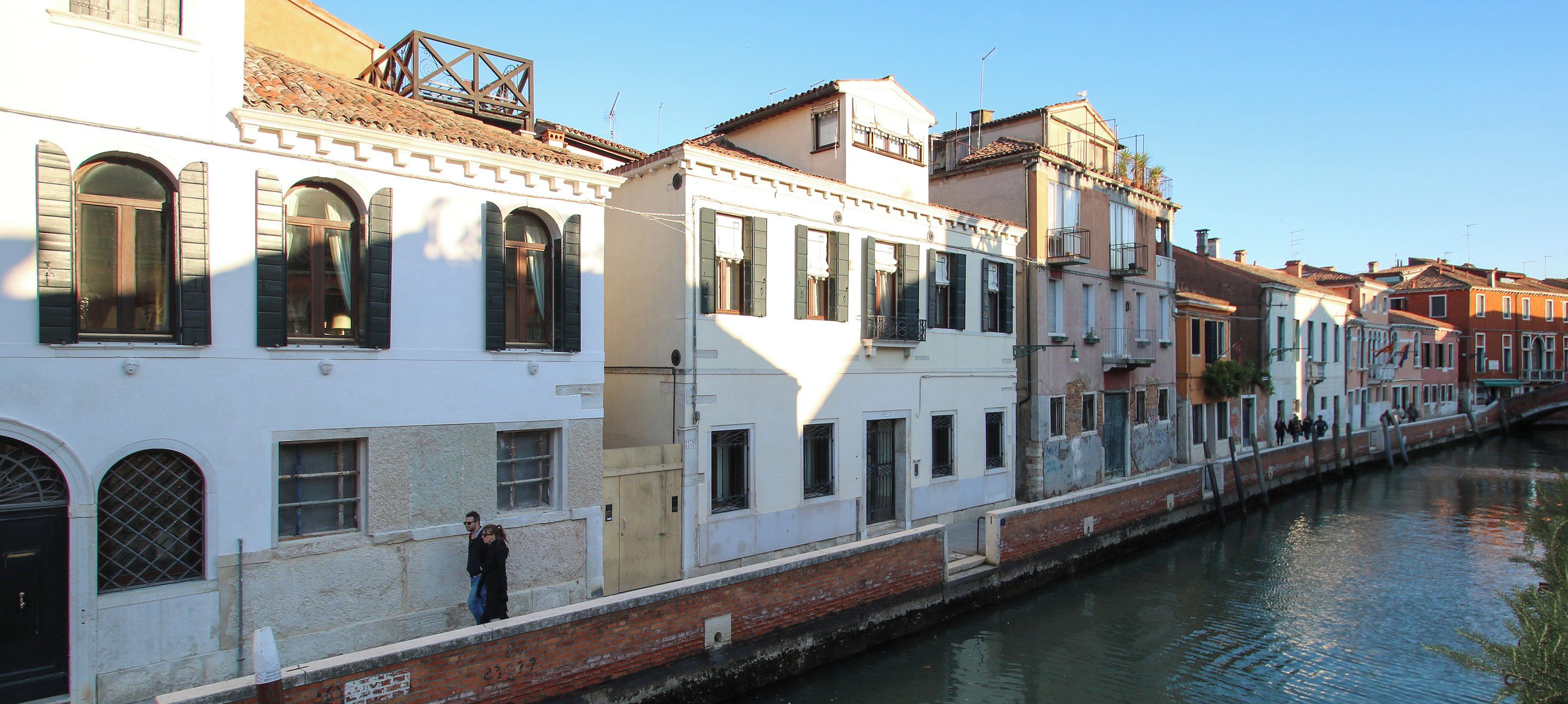 A canal with buildings along its banks.