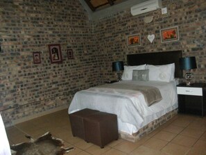 Premium bedding, desk, iron/ironing board, rollaway beds
