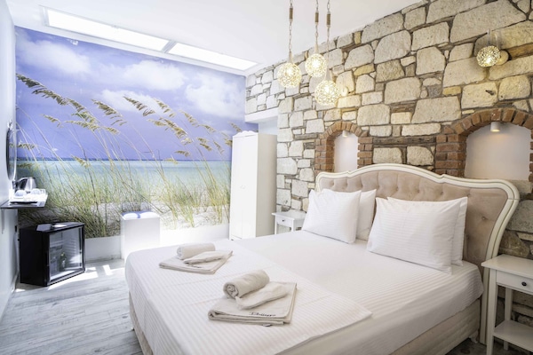 Ropa de cama de alta calidad y minibar