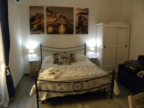 Kolmen hengen deluxe-huone