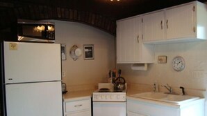 Standard Chalet, 4 Bedrooms, Non Smoking (Husky House) | Private kitchen | Coffee/tea maker, full-size fridge, microwave, oven - Husky House (Bessemer)