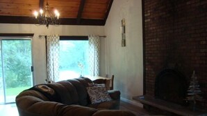 Standard Chalet, 4 Bedrooms, Non Smoking (Husky House) | Living area | 32-inch flat-screen TV with satellite channels, TV, fireplace - Husky House (Bessemer)
