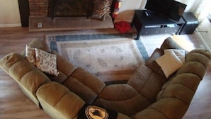 Standard Chalet, 4 Bedrooms, Non Smoking (Husky House) | Living area | 32-inch flat-screen TV with satellite channels, TV, fireplace - Husky House (Bessemer)