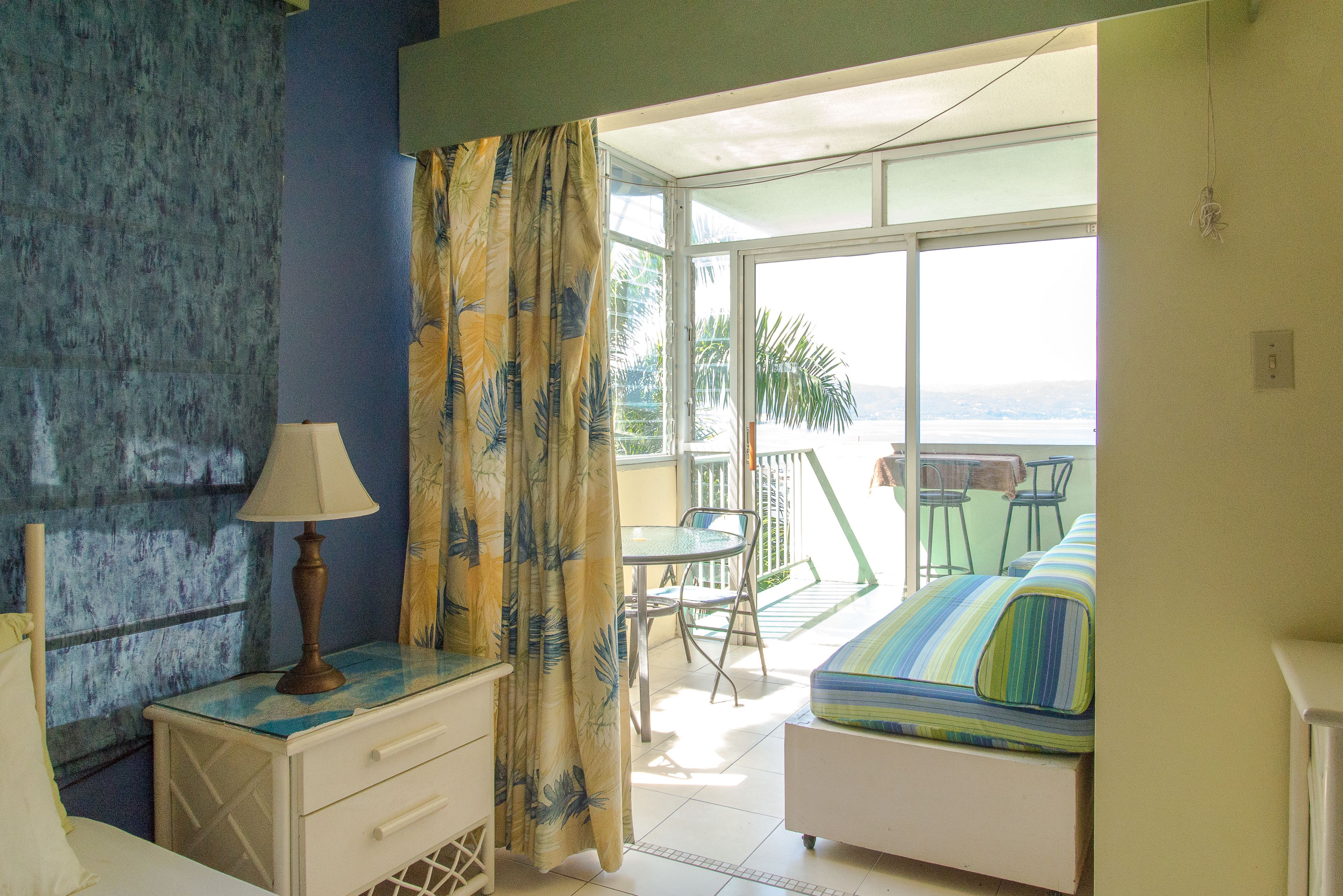 Comfort Studio, Multiple Beds, Accessible, Partial Ocean View | Iron/ironing board, free wired Internet, bed sheets