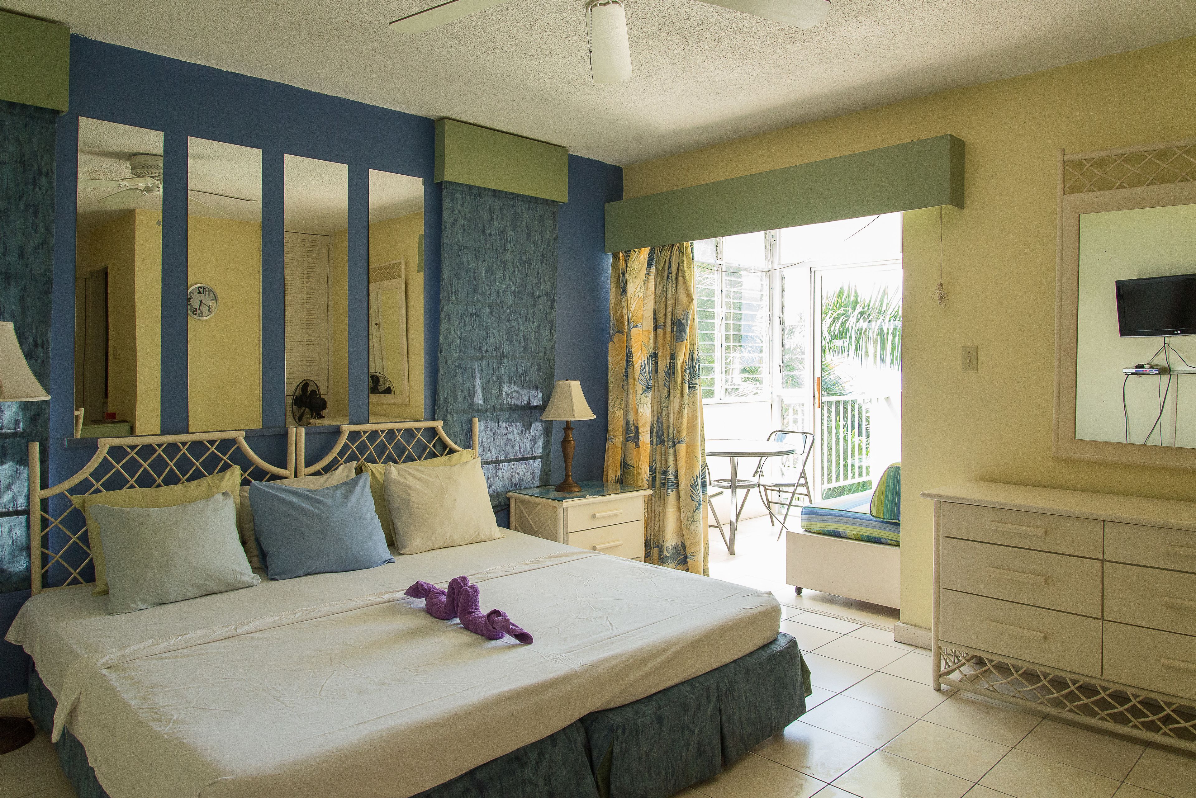 Comfort Studio, Multiple Beds, Accessible, Partial Ocean View | Iron/ironing board, free wired Internet, bed sheets