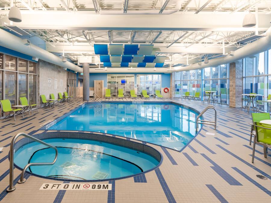 Indoor pool, open 5:30 AM to 11 PM, pool loungers