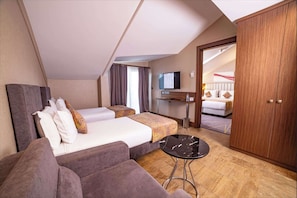 Family Suite, Multiple Beds, Balcony | In-room safe, desk, soundproofing, free cots/infant beds