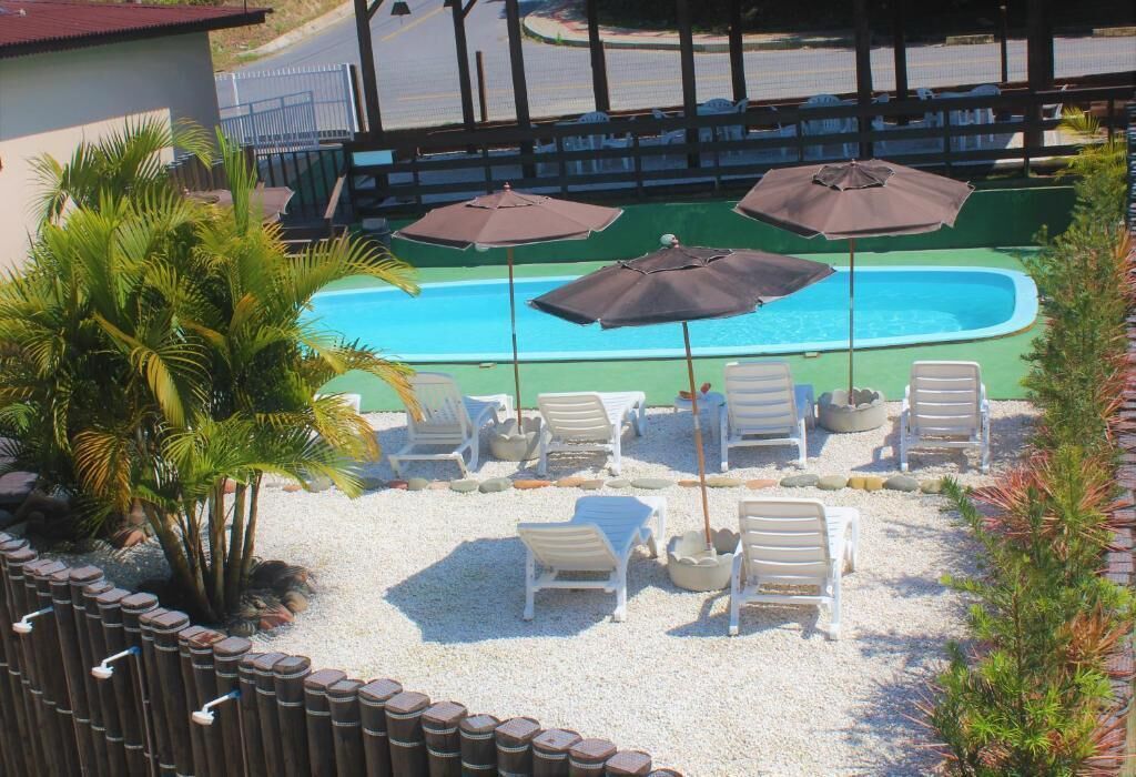 outdoor pool, open 8:00 am to 10:00 am, pool umbrellas, pool loungers