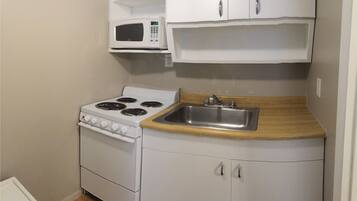 Standard Loft, Kitchen | Private kitchen | Fridge, microwave, coffee/tea maker