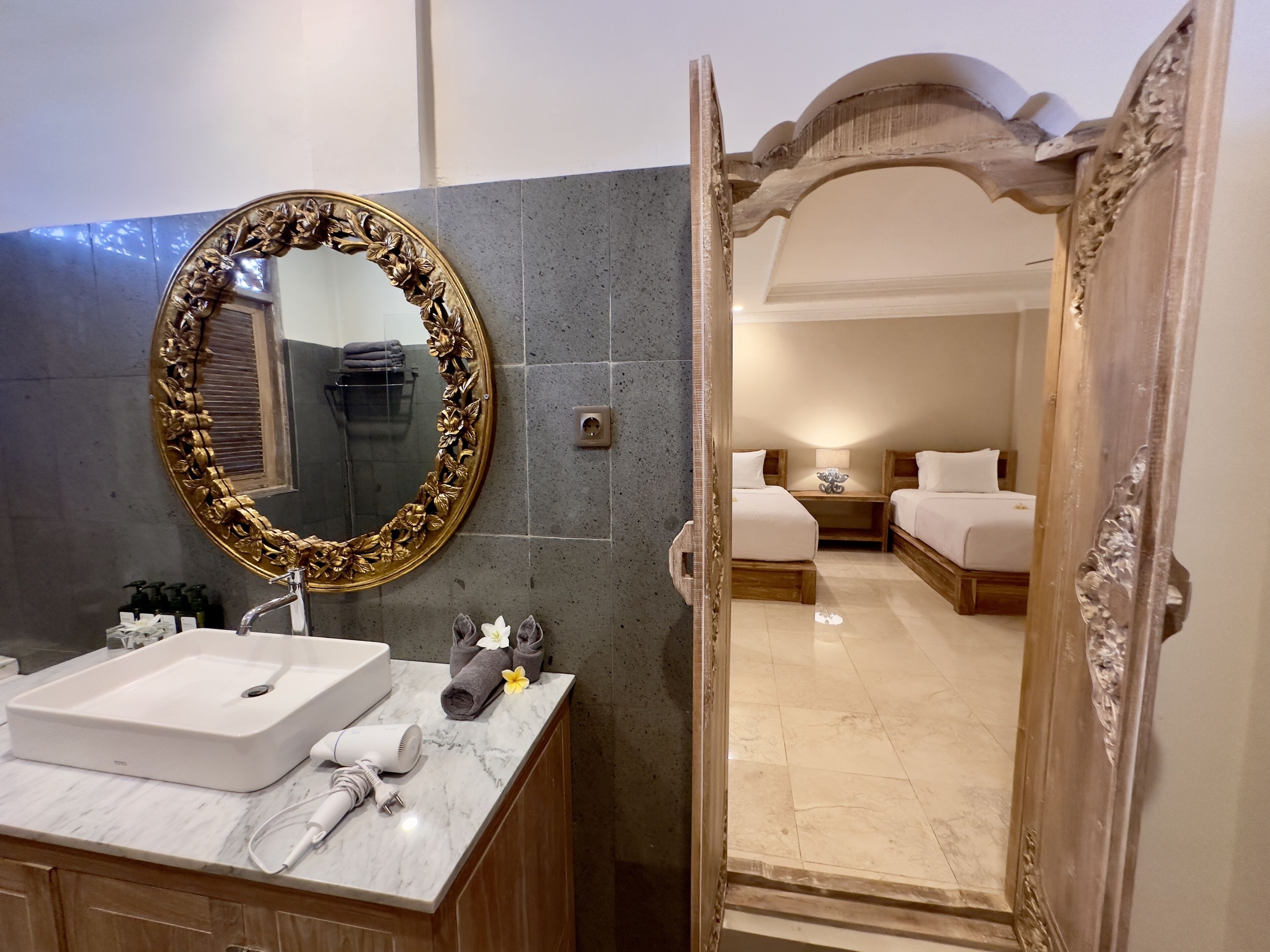 deluxe studio | bathroom | separate bathtub and shower, rainfall showerhead, towels, soap