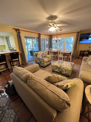 Great Room open to screen porch and Kitchen