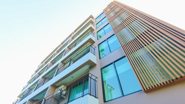 A multi-story building with balconies and large windows. - HuaHin City View (Hua Hin)