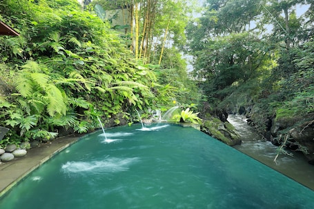 3 outdoor pools, open 7 AM to 9 PM, cabanas (surcharge), pool umbrellas